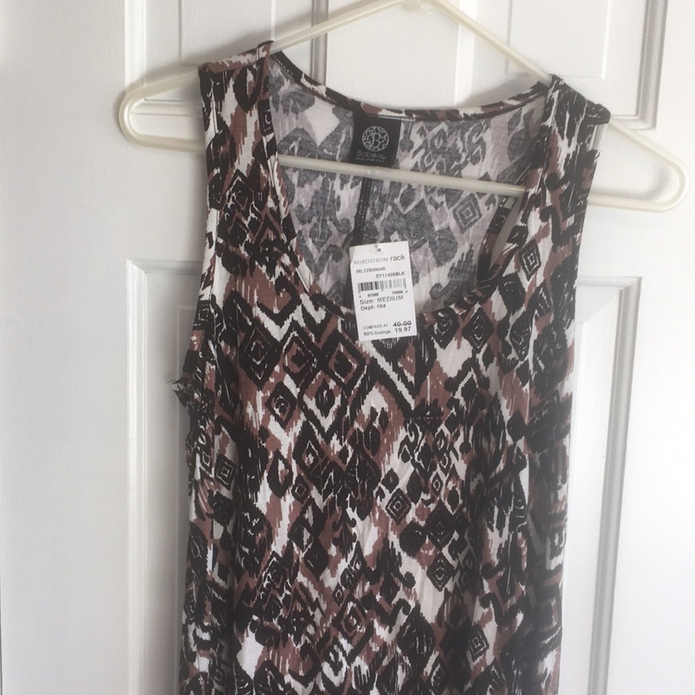 No sleeve tribal tan and black tank top